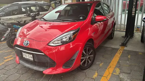 Toyota Prius C 1.5L usado (2018) color Rojo financiado en mensualidades(enganche $103,278 mensualidades desde $7,062)