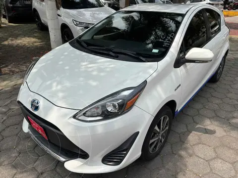 Toyota Prius C 1.5L usado (2021) color Blanco financiado en mensualidades(enganche $82,506 mensualidades desde $7,328)