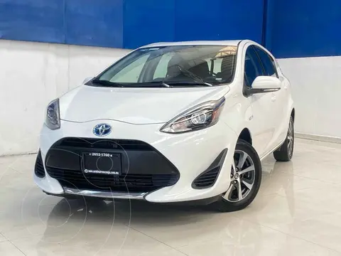 Toyota Prius C 1.5L usado (2019) color Blanco financiado en mensualidades(enganche $67,000 mensualidades desde $4,816)