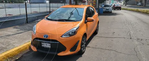 Toyota Prius C 1.5L usado (2019) color Naranja Metalico precio $293,000