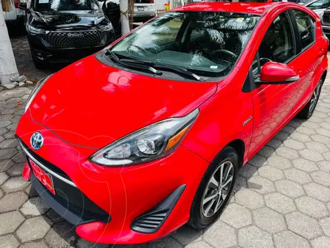 Toyota Prius C 1.5L usado (2019) color Rojo financiado en mensualidades(enganche $80,356 mensualidades desde $7,137)