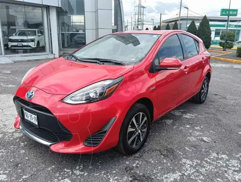 Toyota Prius C 1.5L usado (2021) color Rojo financiado en mensualidades(enganche $66,080 mensualidades desde $7,209)