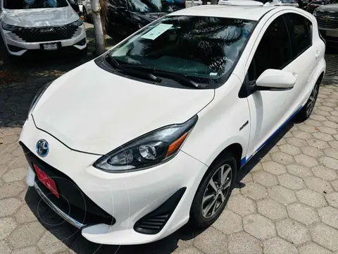 Toyota Prius C 1.5L usado (2021) color Blanco financiado en mensualidades(enganche $82,506 mensualidades desde $7,328)