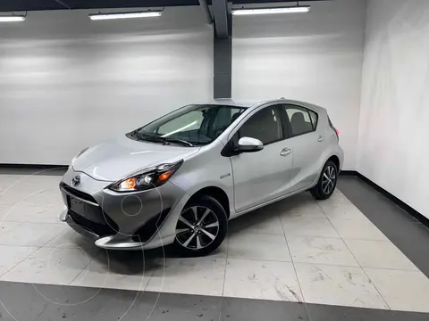 Toyota Prius C 1.5L usado (2018) color Plata financiado en mensualidades(enganche $50,600 mensualidades desde $4,992)
