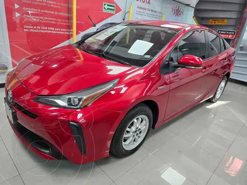 Toyota Prius Base usado (2022) color Rojo financiado en mensualidades(enganche $80,300 mensualidades desde $7,922)