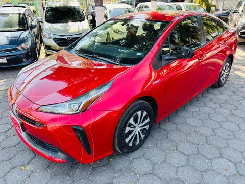 Toyota Prius Base usado (2020) color Rojo financiado en mensualidades(enganche $90,569 mensualidades desde $8,045)