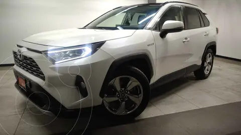 Toyota RAV4 HEV Limited usado (2019) color Blanco financiado en mensualidades(enganche $108,900 mensualidades desde $10,743)