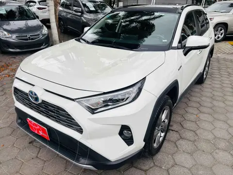 Toyota RAV4 HEV Limited usado (2020) color Blanco financiado en mensualidades(enganche $147,006 mensualidades desde $13,058)
