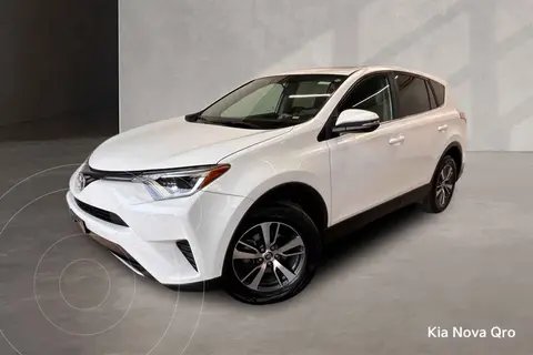 Toyota RAV4 XLE 4WD usado (2016) color Blanco financiado en mensualidades(enganche $81,478 mensualidades desde $6,994)