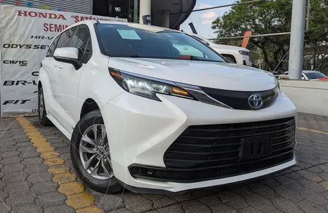 Toyota Sienna HEV LE usado (2021) color Blanco financiado en mensualidades(enganche $201,250 mensualidades desde $11,421)