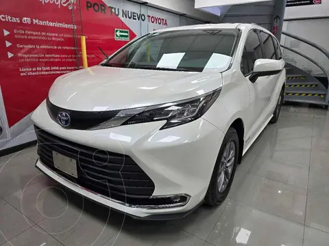 Toyota Sienna HEV XLE Piel usado (2021) color Blanco financiado en mensualidades(enganche $159,522 mensualidades desde $15,737)