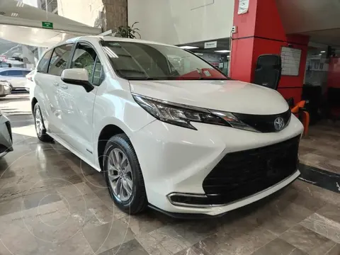 Toyota Sienna HEV LE usado (2021) color Blanco financiado en mensualidades(enganche $238,260 mensualidades desde $10,025)