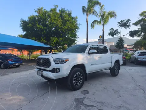 Toyota Tacoma Sport 4x4 usado (2021) color Blanco financiado en mensualidades(enganche $86,974 mensualidades desde $16,181)