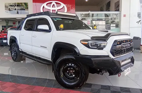 Toyota Tacoma Sport 4x2 usado (2023) color Blanco financiado en mensualidades(enganche $250,800 mensualidades desde $10,774)