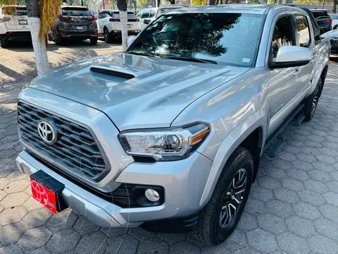 Toyota Tacoma Sport 4x2 usado (2023) color Plata financiado en mensualidades(enganche $173,881 mensualidades desde $15,445)