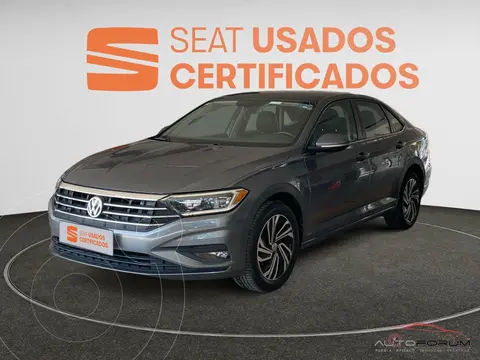 Volkswagen Jetta Highline usado (2021) color Gris financiado en mensualidades(enganche $102,500 mensualidades desde $7,559)