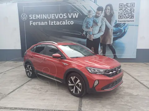 Volkswagen Nivus Highline usado (2024) color Rojo financiado en mensualidades(enganche $67,499 mensualidades desde $10,461)