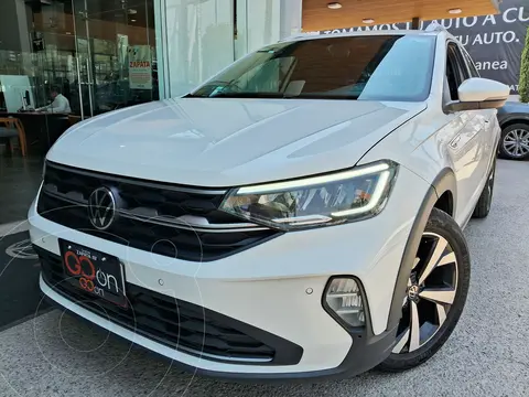 Volkswagen Nivus Highline usado (2024) color Blanco financiado en mensualidades(enganche $106,002 mensualidades desde $8,106)