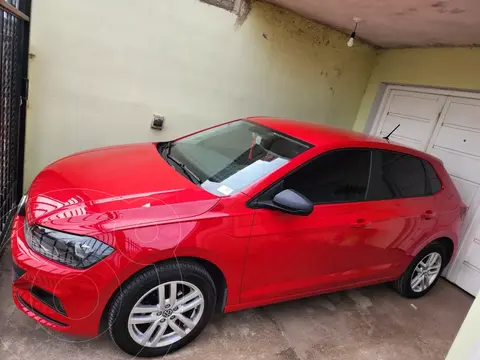 Volkswagen Polo 5P Trendline usado (2022) color Rojo financiado en cuotas(anticipo $1.000.000 cuotas desde $215.000)