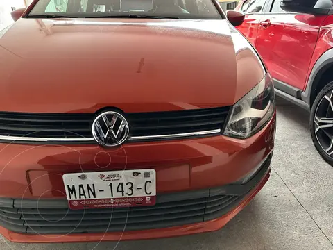 Volkswagen Polo Hatchback 1.2L TSI Aut usado (2017) color Naranja precio $164,500
