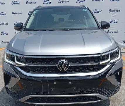 Volkswagen Taos Highline usado (2022) color Gris Oscuro financiado en mensualidades(enganche $101,200 mensualidades desde $11,478)