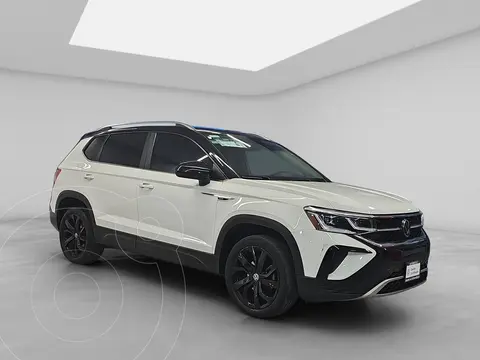 Volkswagen Taos Highline usado (2023) color Blanco financiado en mensualidades(enganche $122,352 mensualidades desde $11,155)