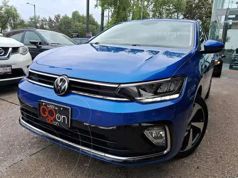 Volkswagen Virtus Highline usado (2023) color Azul financiado en mensualidades(enganche $94,012 mensualidades desde $7,189)